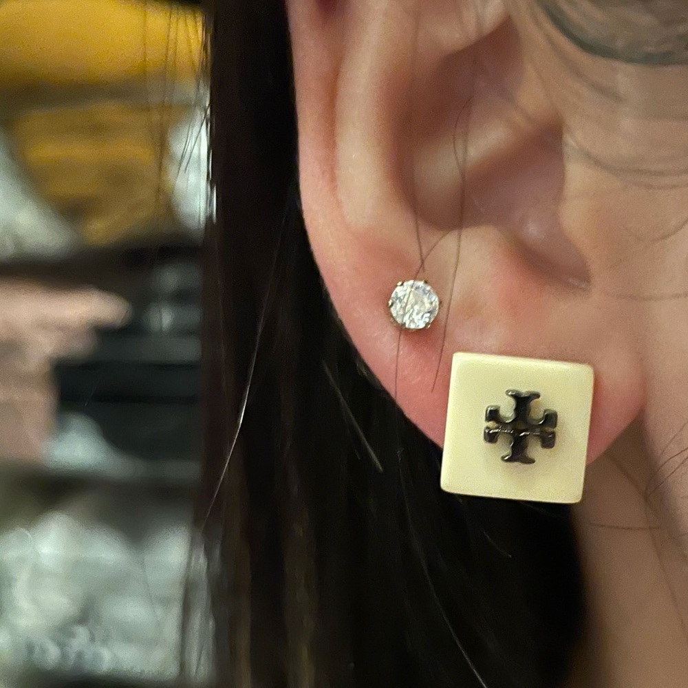 Tory Burch earring.